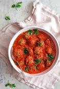 MeatBalls in Tomato Sauce with one Free Side Dish